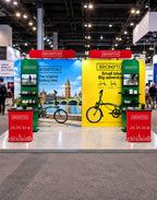 10x20 modular exhibit booth with backwall, TV display, and two counters